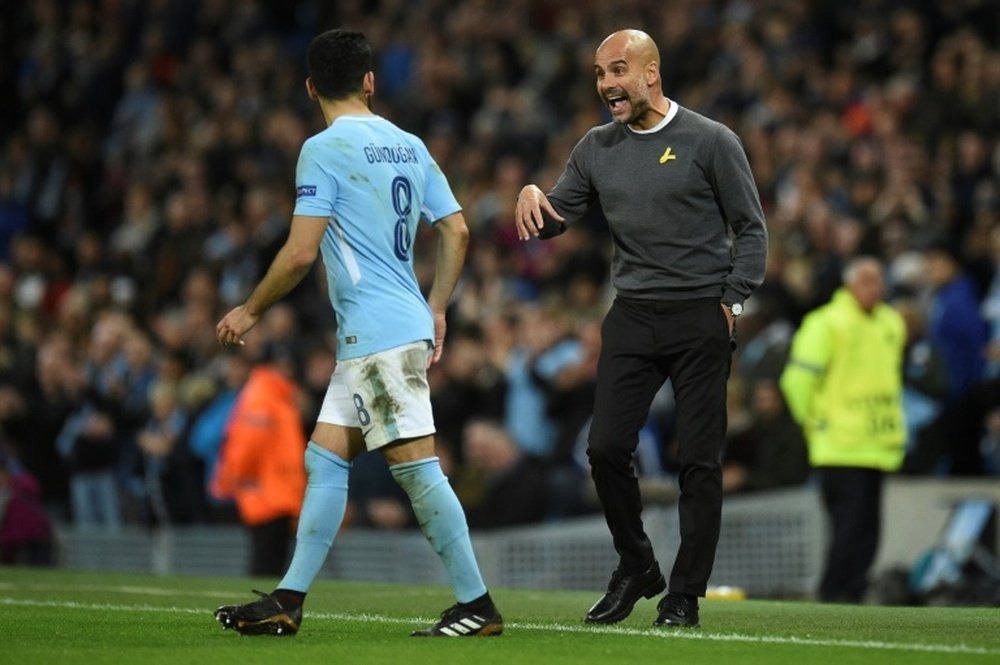 Gundogan là học trò thân tín của HLV Guardiola trước khi rời Man City để tìm thử thách mới hè 2023. Ảnh: AFP